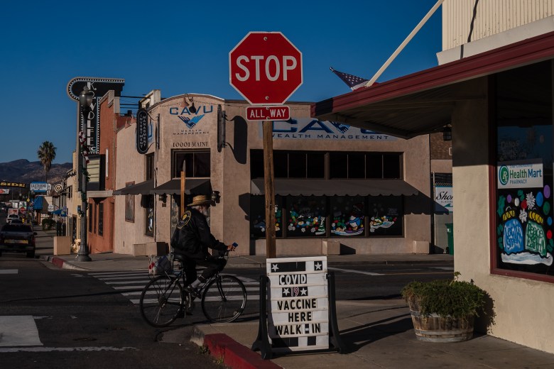 A Covid-19 vaccine sign can be seen in front of Leo's Lakeside Pharmacy on Dec. 10, 2022.